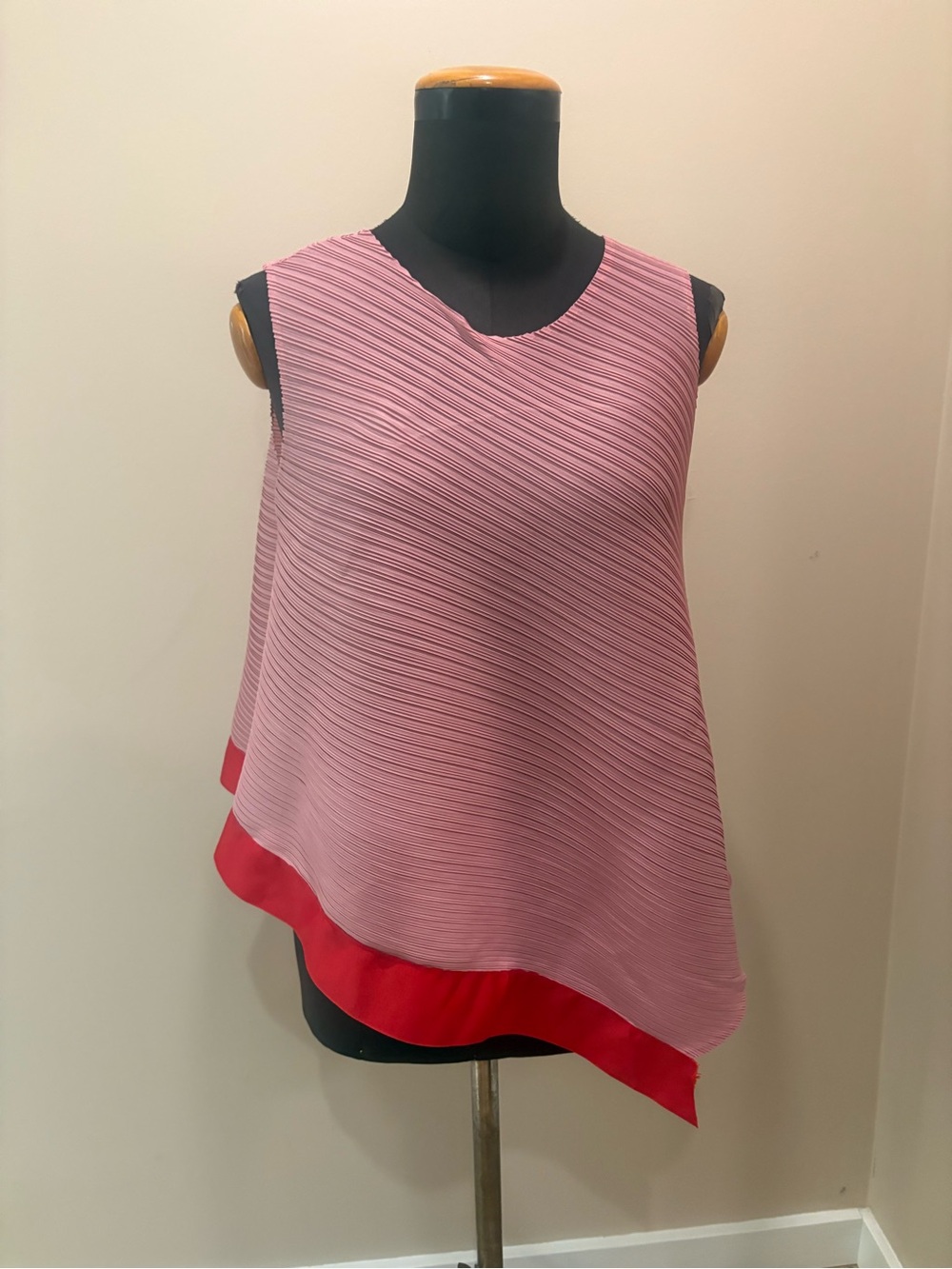 Brand new Pleated asymmetrical Sleeveless Pink Layered Swing Top with Red Hem